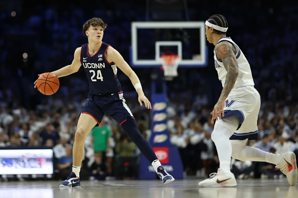 Feb 21, 2026; Philadelphia, Pennsylvania, USA; UConn Huskies guard Braylon Mullins (24) dribbles the ball against the Villanova Wildcats during the first half at Xfinity Mobile Arena. Mandatory Credit: Bill Streicher-Imagn Images