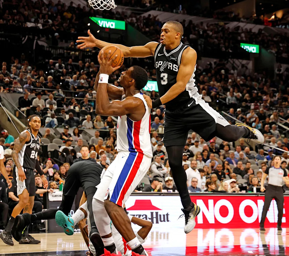 Johnson goes for a block against the Detroit Pistons at Frost Bank Center in San Antonio on March 5. (Ronald Cortes / Getty Images)