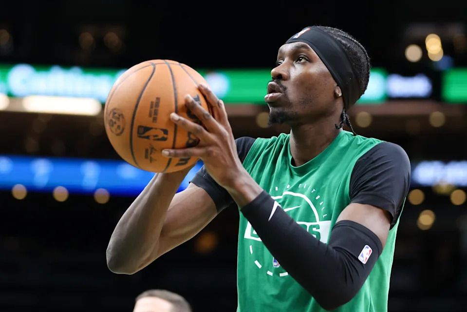Nov 16, 2025; Boston, Massachusetts, USA; Boston Celtics center Chris Boucher (99) warms up before a game against the Los Angeles Clippers at TD Garden. Mandatory Credit: Paul Rutherford-Imagn Images