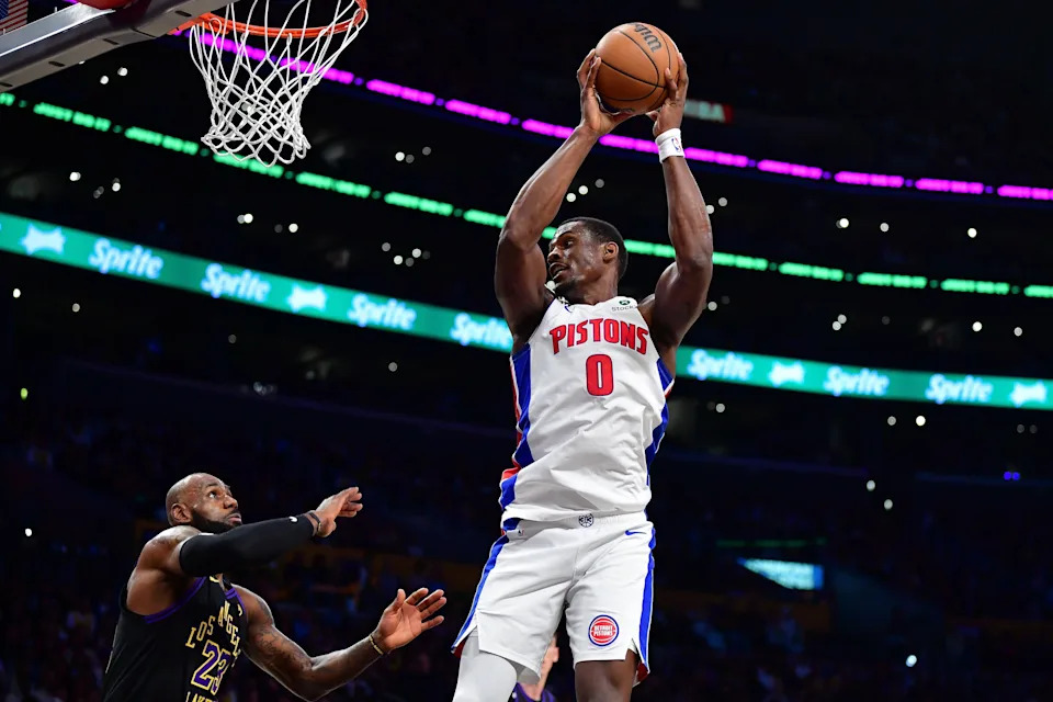 Detroit Pistons center Jalen Duren (0) gets the rebound against Los Angeles Lakers forward LeBron James (23) during the first half at Crypto.com Arena in Los Angeles on Tuesday, Dec. 30, 2025.