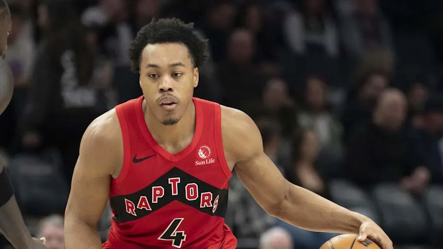 Toronto Raptors forward Scottie Barnes dribbles the ball against the Minnesota Timberwolves