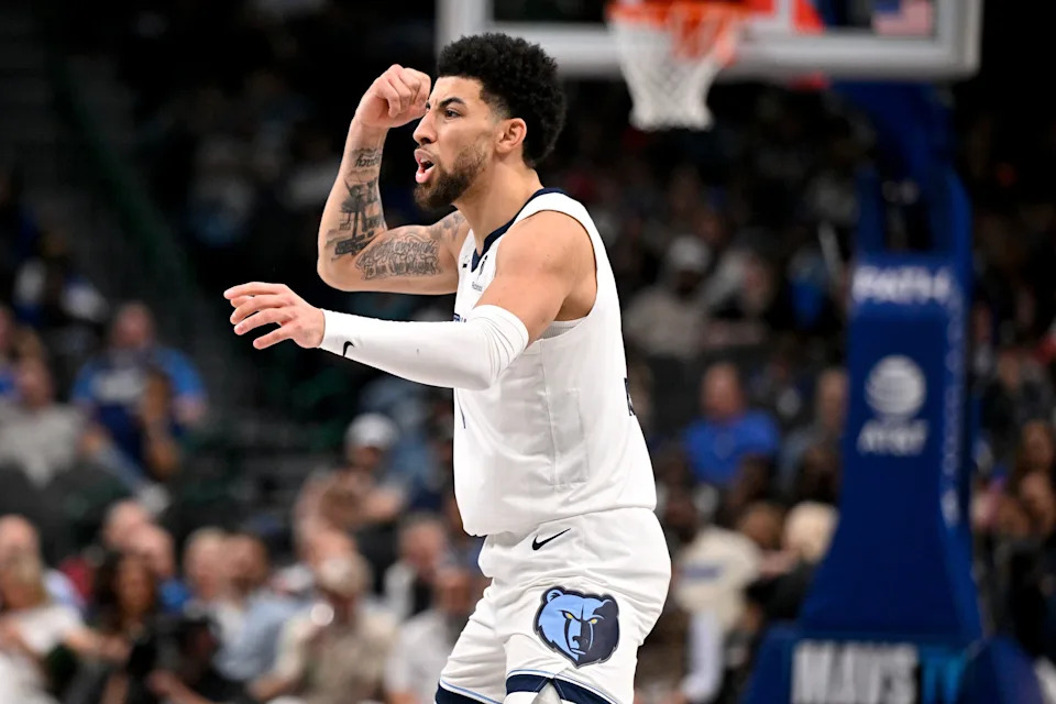 Feb 27, 2026; Dallas, Texas, USA; Memphis Grizzlies guard Scotty Pippen Jr. (1) motions to his teammates during the second half against the Dallas Mavericks at the American Airlines Center. Mandatory Credit: Jerome Miron-Imagn Images