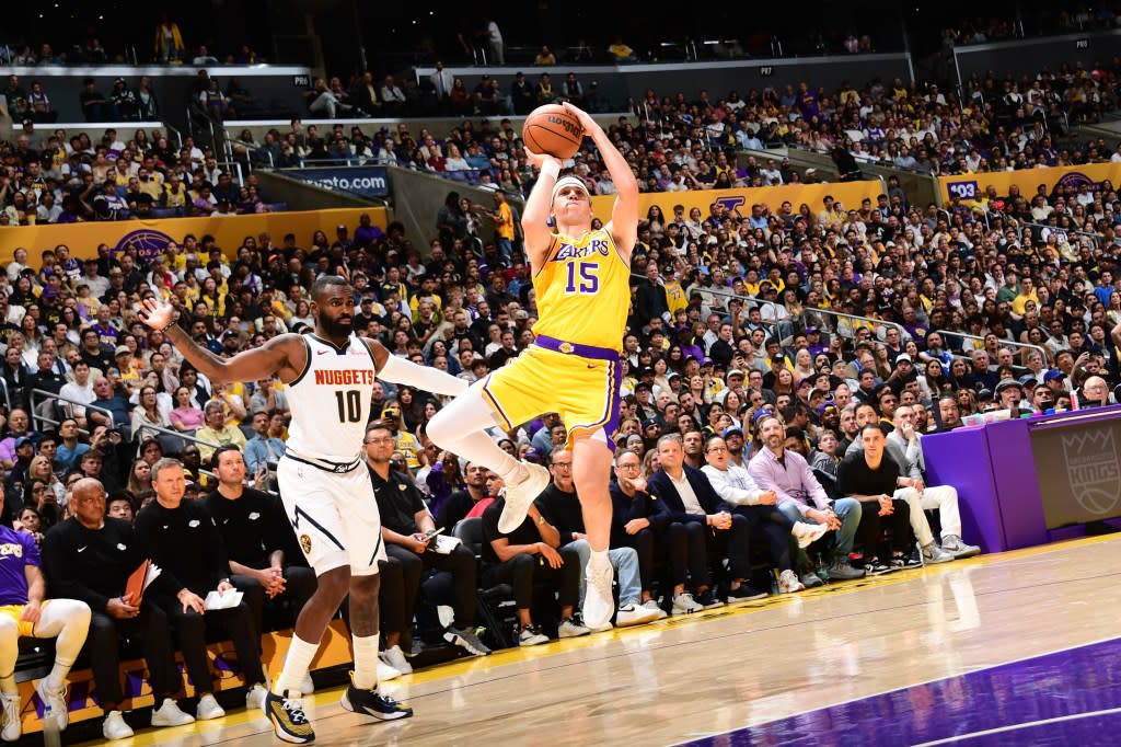 Austin Reaves of the Los Angeles Lakers shoots the ball during the game against the Denver Nuggets on March 14, 2026 at Crypto.Com Arena in Los Angeles, California. (Photo by Adam Pantozzi/NBAE via Getty Images) NBAE via Getty Images