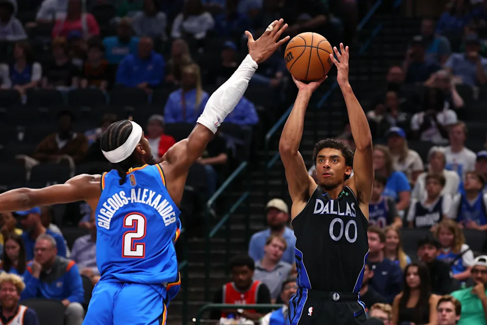 DALLAS, TEXAS - MARCH 01: Max Christie #00 of the Dallas Mavericks shoots against Shai Gilgeous-Alexander #2 of the Oklahoma City Thunder during the fourth quarter at American Airlines Center on March 01, 2026 in Dallas, Texas. NOTE TO USER: User expressly acknowledges and agrees that, by downloading and or using this photograph, user is consenting to the terms and conditions of the Getty Images License Agreement. (Photo by Sam Hodde/Getty Images)