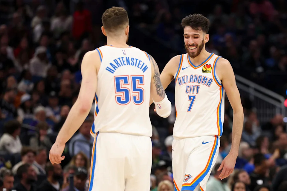 Mar 17, 2026; Orlando, Florida, USA; Oklahoma City Thunder center Chet Holmgren (7) and center Isaiah Hartenstein (55) react after a basket against the Orlando Magic in the second quarter at Kia Center. Mandatory Credit: Nathan Ray Seebeck-Imagn Images