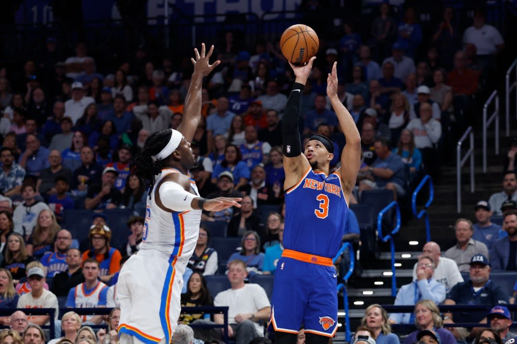 Josh Hart (3) shoots a 3-point basket as Oklahoma City Thunder guard Luguentz Dort (5) defends during the first half at Paycom Center. IMAGN IMAGES via Reuters Connect