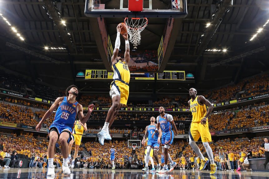 Bennedict Mathurin #00 of the Indiana Pacers dunks the ball during the game against the Oklahoma City Thunder.