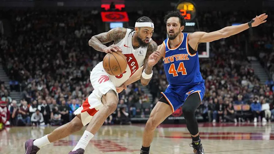 Toronto Raptors forward Brandon Ingram drives to the basket against New York Knicks guard Landry Shamet
