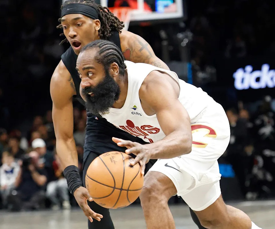 James Harden dribbles the basketball while being guarded by a Brooklyn Nets player. Robert Sabo for NY Post