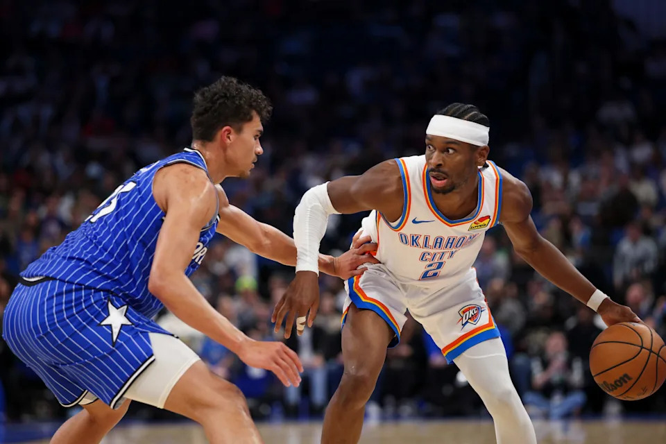 Mar 17, 2026; Orlando, Florida, USA; Oklahoma City Thunder guard Shai Gilgeous-Alexander (2) is guarded by Orlando Magic forward Tristan da Silva (23) in the third quarter at Kia Center. Mandatory Credit: Nathan Ray Seebeck-Imagn Images
