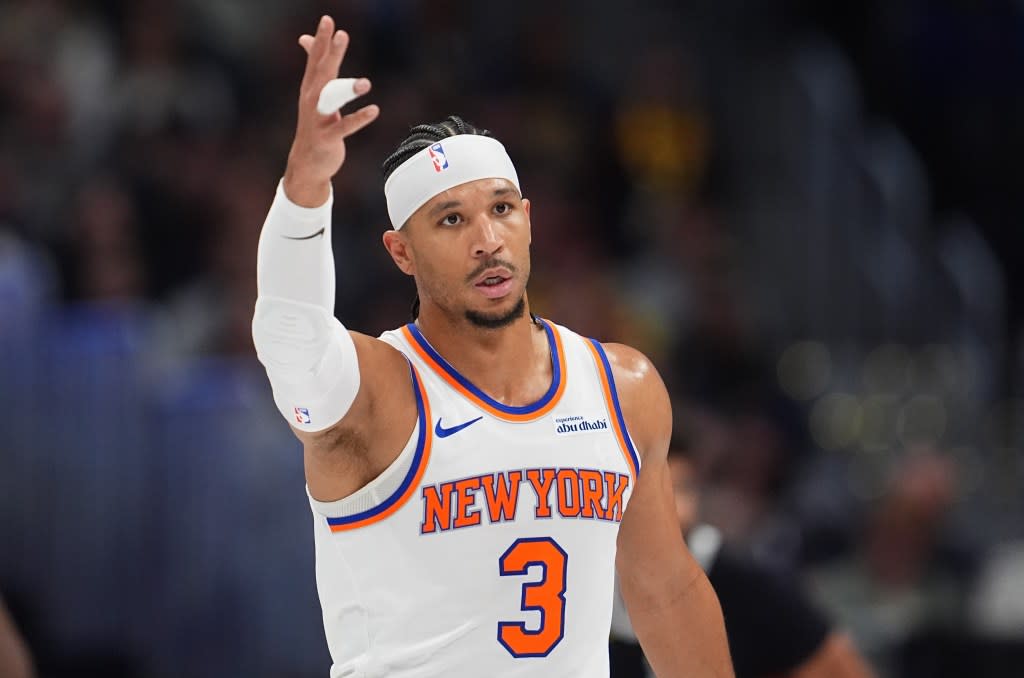 Josh Hart gestures to the bench after hitting a 3-pointer in the Knicks’ road win over the Nuggets. AP