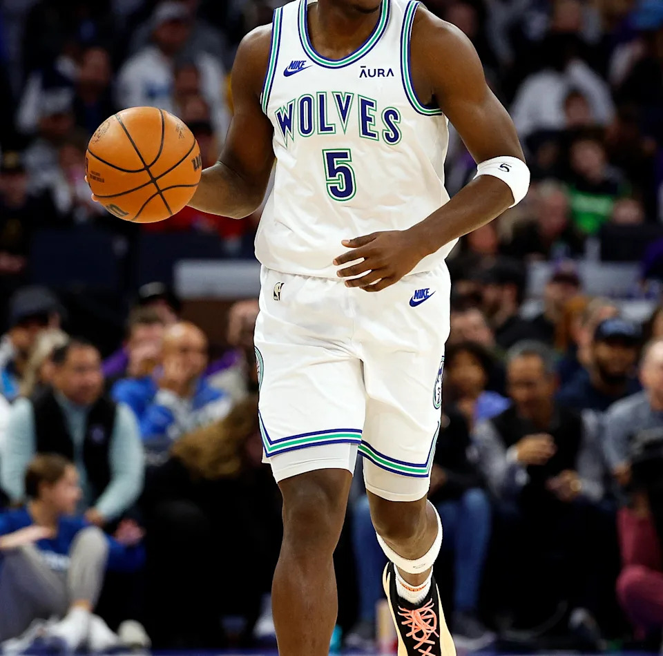 MINNEAPOLIS, MINNESOTA – DECEMBER 30: Anthony Edwards #5 of the Minnesota Timberwolves dribbles the ball against the Los Angeles Lakers in the first quarter at Target Center on December 30, 2023 in Minneapolis, Minnesota. The Timberwolves defeated the Lakers 108-106. NOTE TO USER: User expressly acknowledges and agrees that, by downloading and or using this photograph, User is consenting to the terms and conditions of the Getty Images License Agreement. (Photo by David Berding/Getty Images) | Getty Images