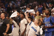 Fans cheer during The Dallas Mavericks Fan Jam at American Airline Center in Dallas, Texas,...