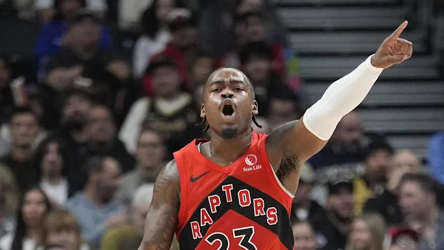 Toronto Raptors guard Jamal Shead directs us teammates against the Detroit Pistons