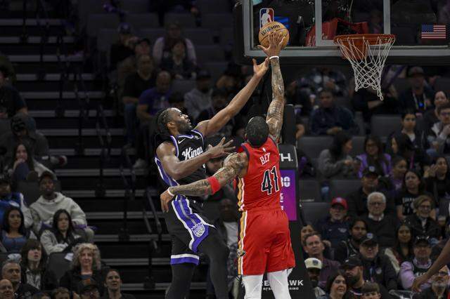 Sacramento Kings forward Precious Achiuwa (9) makes a basket against New Orleans Pelicans guard Saddiq Bey (41) during an NBA game at Golden 1 Center on Thursday.