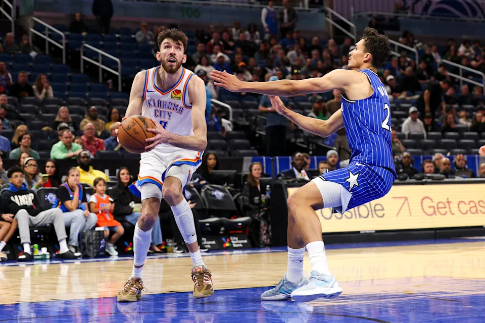 Mar 17, 2026; Orlando, Florida, USA; Oklahoma City Thunder center Chet Holmgren (7) drives to the basket past Orlando Magic forward Tristan da Silva (23) in the fourth quarter at Kia Center. Mandatory Credit: Nathan Ray Seebeck-Imagn Images