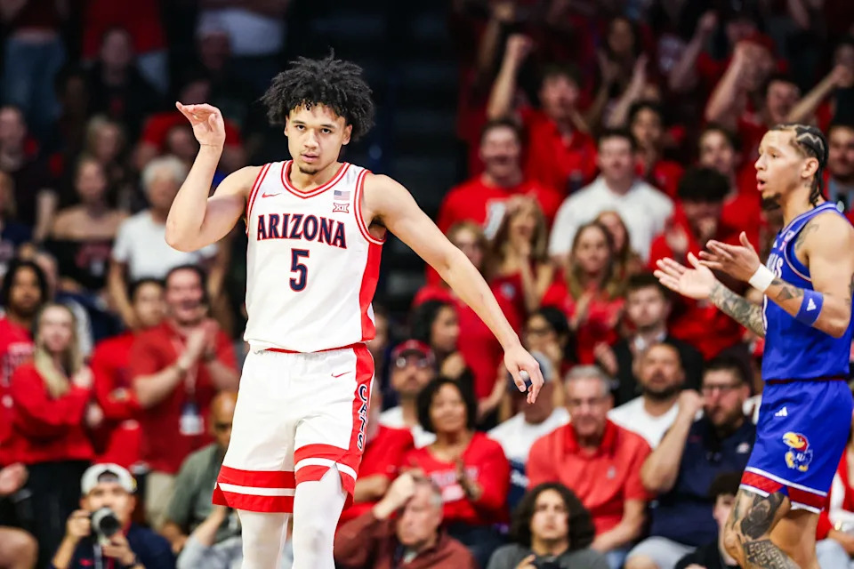 Feb 28, 2026; Tucson, Arizona, USA; Arizona Wildcats guard Brayden Burries (5) celebrates during the first half of the game against the Kansas Jayhawks at McKale Memorial Center. Mandatory Credit: Aryanna Frank-Imagn Images