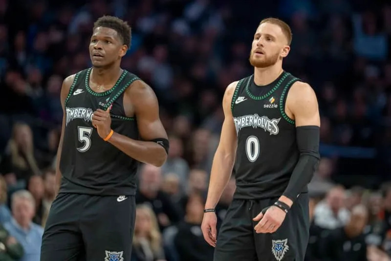 Mar 3, 2026; Minneapolis, Minnesota, USA; Minnesota Timberwolves guard Anthony Edwards (5) and guard Donte DiVincenzo (0) in the second half against the Memphis Grizzlies at Target Center. Mandatory Credit: Jesse Johnson-Imagn Images