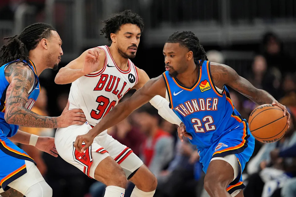 CHICAGO, ILLINOIS - MARCH 03: Cason Wallace #22 of the Oklahoma City Thunder dribbles the ball against Tre Jones #30 of the Chicago Bulls during the fourth quarter at the United Center on March 03, 2026 in Chicago, Illinois. NOTE TO USER: User expressly acknowledges and agrees that, by downloading and or using this photograph, User is consenting to the terms and conditions of the Getty Images License Agreement. (Photo by Patrick McDermott/Getty Images)