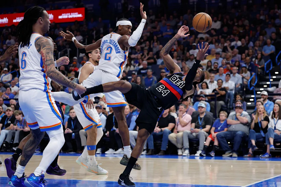Mar 30, 2026; Oklahoma City, Oklahoma, USA; Detroit Pistons guard Daniss Jenkins (24) reaches for a loose ball as he falls back during the first half against the Oklahoma City Thunder at Paycom Center. Mandatory Credit: Alonzo Adams-Imagn Images