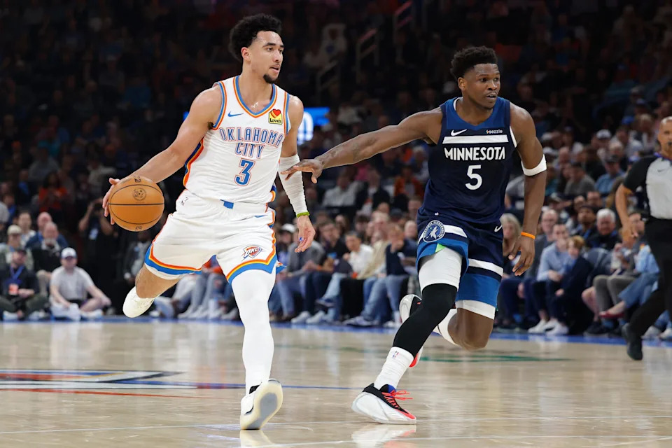 Mar 15, 2026; Oklahoma City, Oklahoma, USA; Oklahoma City Thunder guard Jared McCain (3) dribbles down the court beside Minnesota Timberwolves guard Anthony Edwards (5) during the first half at Paycom Center. Mandatory Credit: Alonzo Adams-Imagn Images