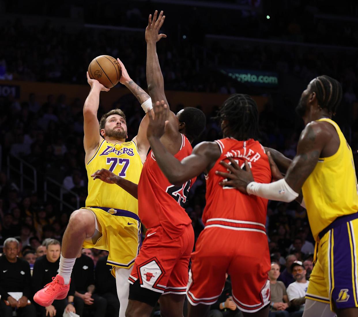 Lakers star Luka Doncic shoots over Bulls forward Jalen Smith (25) in the second half Thursday.