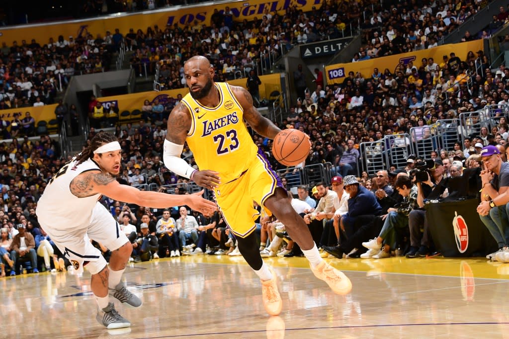 LeBron James of the Los Angeles Lakers drives to the basket during the game against the Denver Nuggets on March 14, 2026 at Crypto.Com Arena in Los Angeles, California. (Photo by Adam Pantozzi/NBAE via Getty Images) NBAE via Getty Images