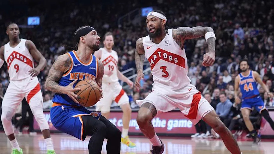 Toronto Raptors forward Brandon Ingram defends against New York Knicks guard Jose Alvarado