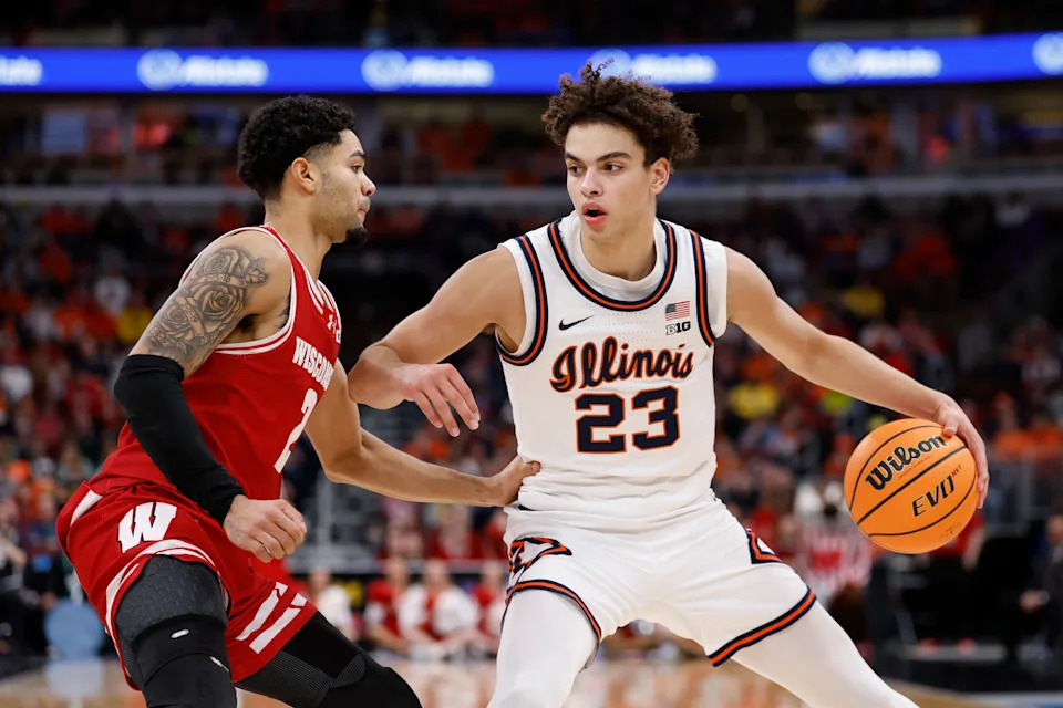 Mar 13, 2026; Chicago, IL, USA; Wisconsin Badgers guard Nick Boyd (2) defends against Illinois Fighting Illini guard Keaton Wagler (23) during the second half at United Center. Mandatory Credit: Kamil Krzaczynski-Imagn Images
