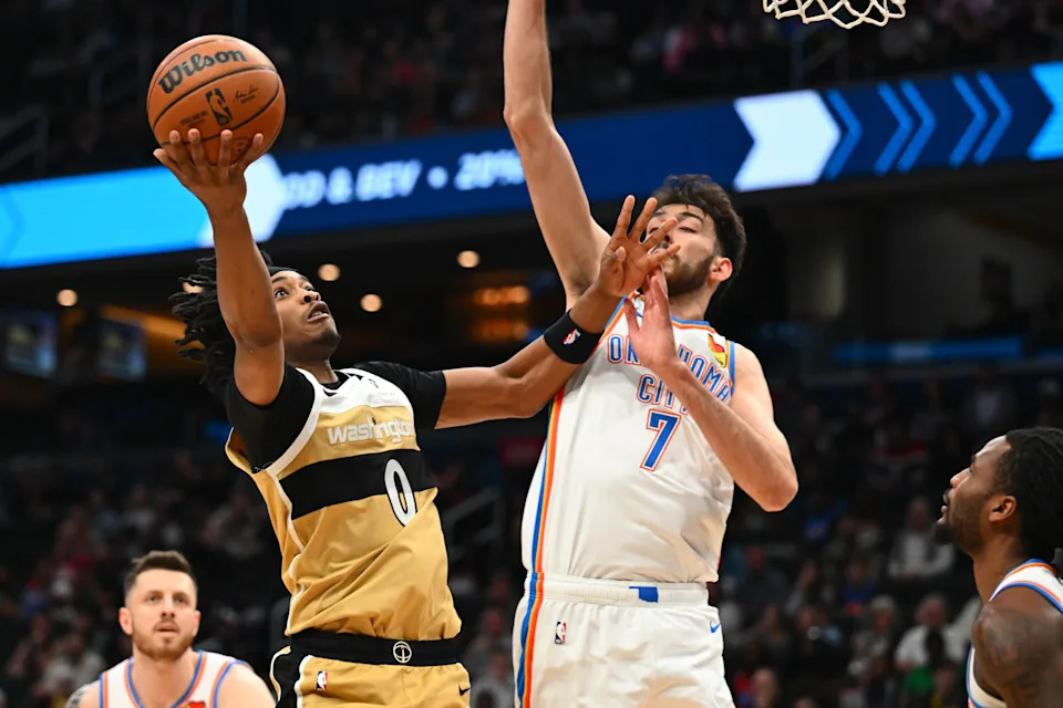 Mar 21, 2026; Washington, District of Columbia, USA; Washington Wizards guard Bilal Coulibaly (0) shoots over Oklahoma City Thunder center/forward Chet Holmgren (7) during the first half at Capital One Arena. Mandatory Credit: Brad Mills-Imagn Images