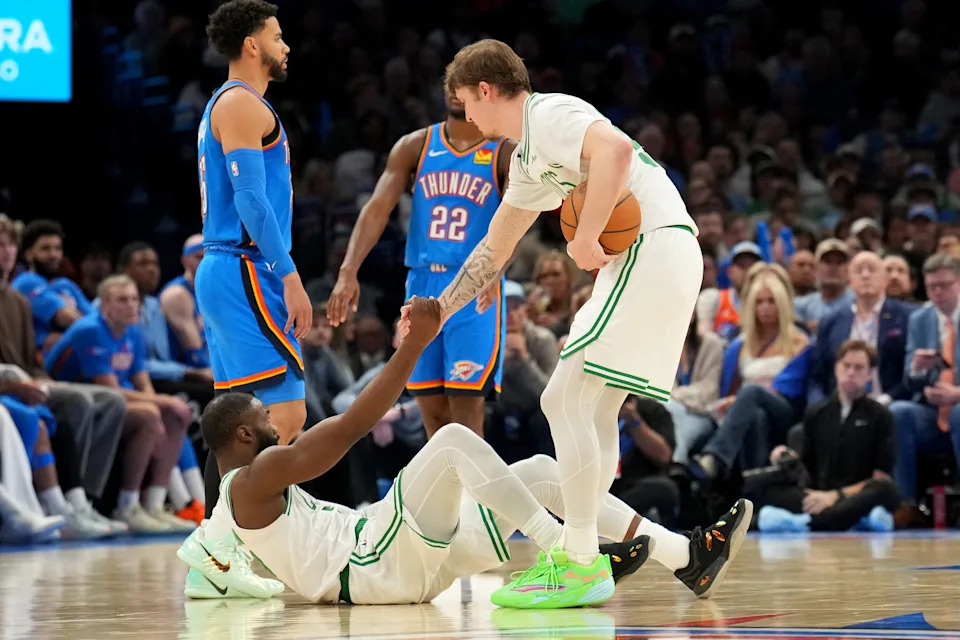 OKLAHOMA CITY, OK – MARCH 12: Jaylen Brown #7 is helped up by Baylor Scheierman #55 of the Boston Celtics during the game against the Oklahoma City Thunder on March 12, 2026 at Paycom Center in Oklahoma City, Oklahoma. NOTE TO USER: User expressly acknowledges and agrees that, by downloading and or using this photograph, User is consenting to the terms and conditions of the Getty Images License Agreement. Mandatory Copyright Notice: Copyright 2026 NBAE (Photo by Jesse D. Garrabrant/NBAE via Getty Images) | NBAE via Getty Images