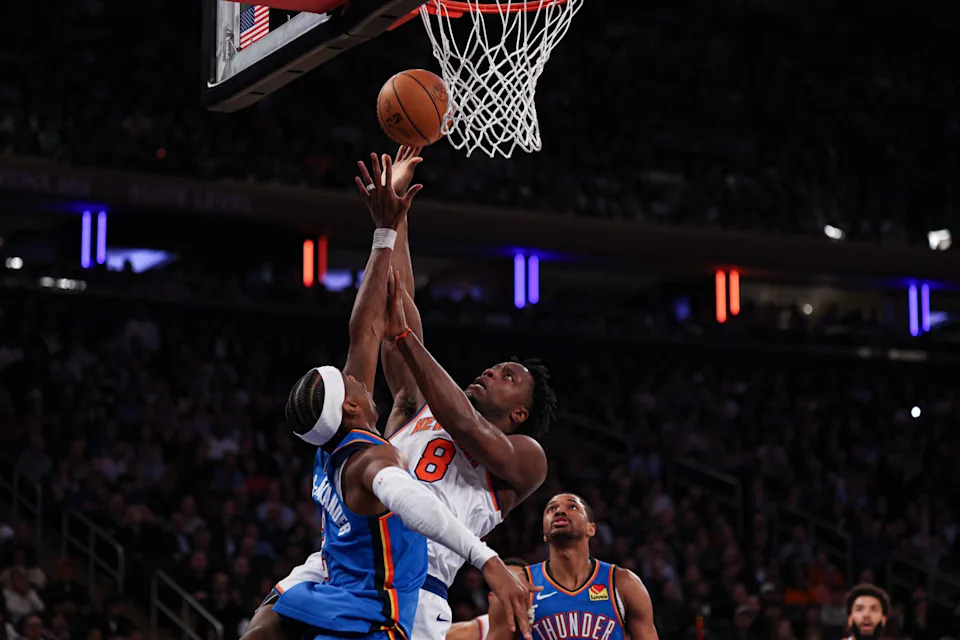 Mar 4, 2026; New York, New York, USA; New York Knicks guard Jose Alvarado (5) goes to the basket against Oklahoma City Thunder guard Shai Gilgeous-Alexander (2) during the second half at Madison Square Garden. Mandatory Credit: Vincent Carchietta-Imagn Images