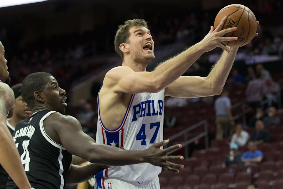 Philadelphia 76ers center Tiago Splitter shoots against Brooklyn Nets forward Andrew Nicholson during the second half at Wells Fargo Center. The Brooklyn Nets won 141-118.