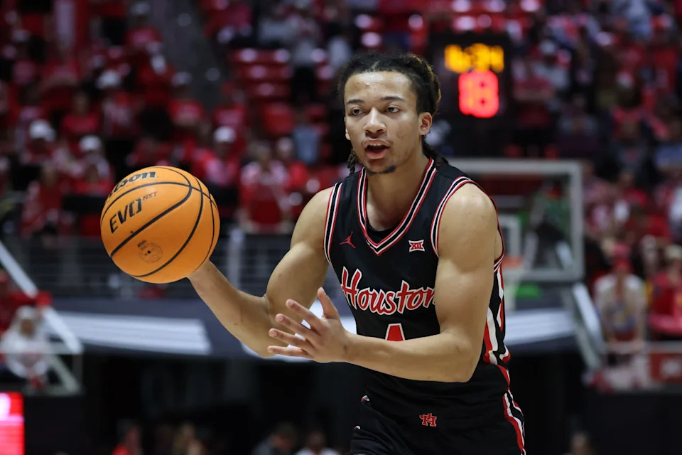Feb 10, 2026; Salt Lake City, Utah, USA; Houston Cougars guard Kingston Flemings (4) looks to pass against the Utah Utes during the first half at Jon M. Huntsman Center. Mandatory Credit: Rob Gray-Imagn Images