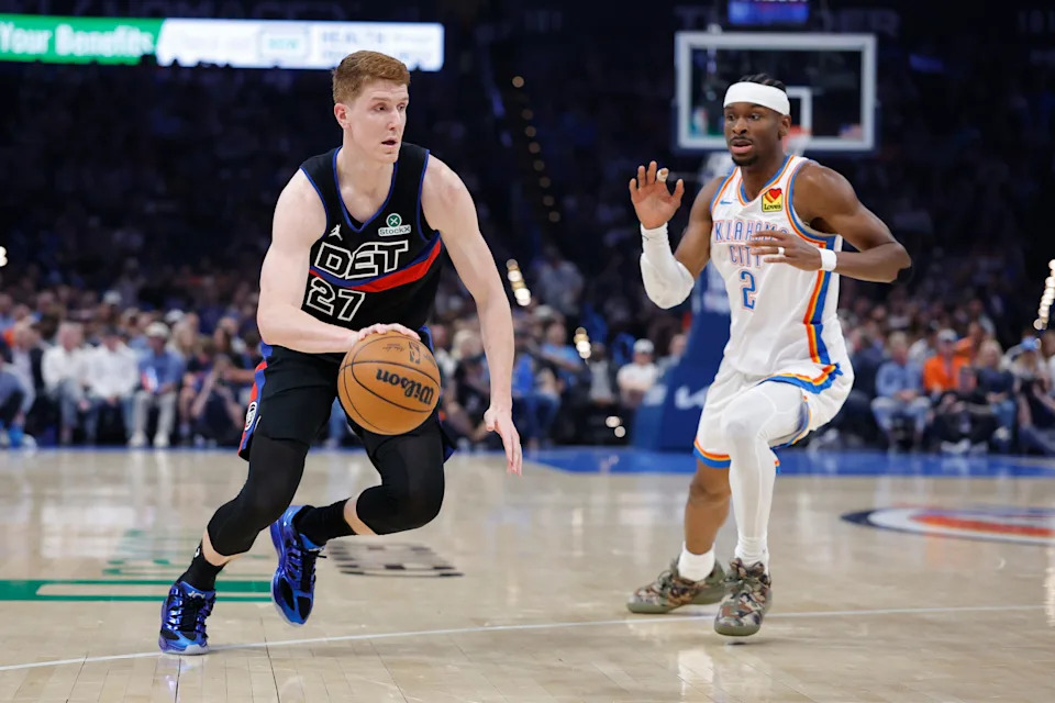 Mar 30, 2026; Oklahoma City, Oklahoma, USA; Detroit Pistons guard Kevin Huerter (27) drives down the court past Oklahoma City Thunder guard Shai Gilgeous-Alexander (2) during the first half at Paycom Center. Mandatory Credit: Alonzo Adams-Imagn Images