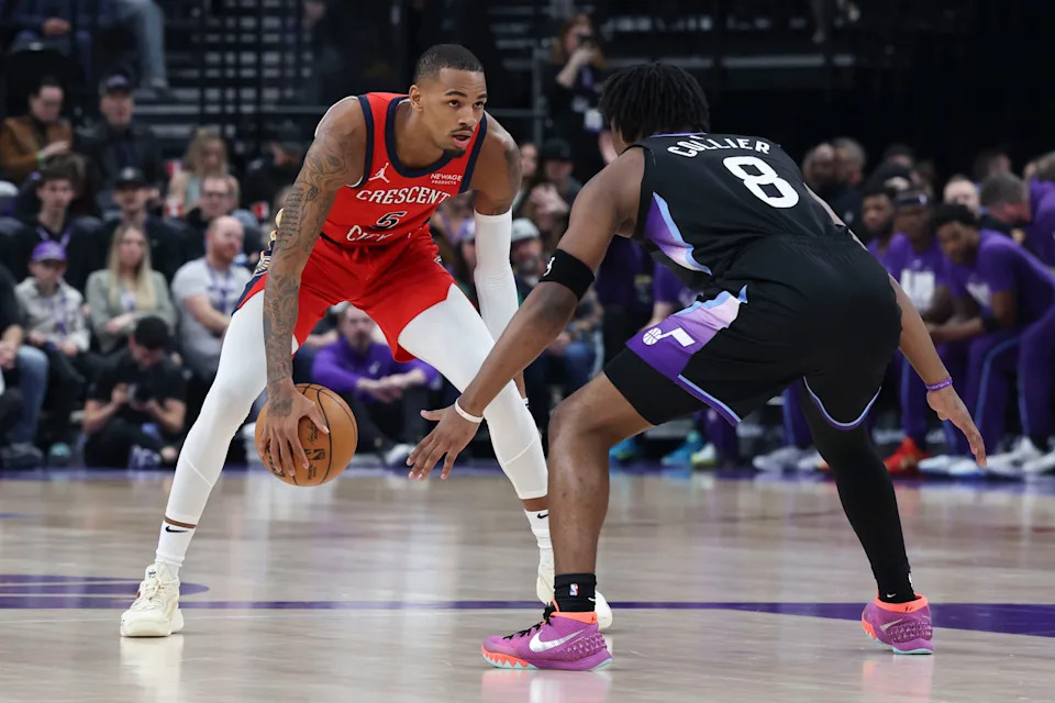 Feb 26, 2026; Salt Lake City, Utah, USA; New Orleans Pelicans guard Dejounte Murray (5) looks for the play against Utah Jazz guard Isaiah Collier (8) during the first half at Delta Center. Mandatory Credit: Rob Gray-Imagn Images