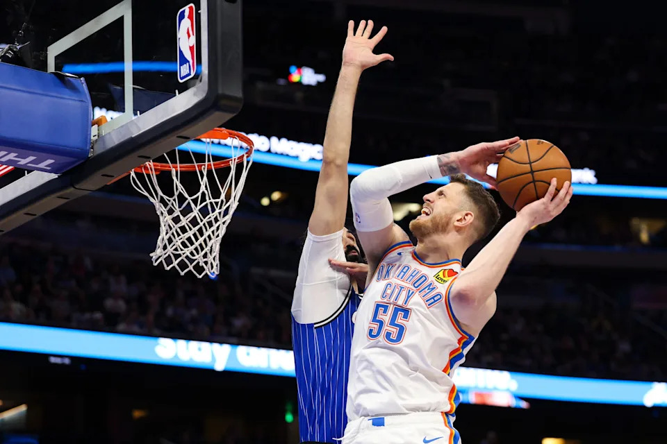 Mar 17, 2026; Orlando, Florida, USA; Oklahoma City Thunder center Isaiah Hartenstein (55) drives to the basket against the Orlando Magic in the fourth quarter at Kia Center. Mandatory Credit: Nathan Ray Seebeck-Imagn Images