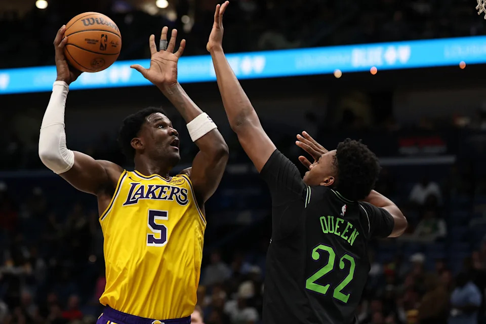 NEW ORLEANS, LOUISIANA - JANUARY 06: Deandre Ayton #5 of the Los Angeles Lakers shoots the ball over Derik Queen #22 of the New Orleans Pelicans at Smoothie King Center on January 06, 2026 in New Orleans, Louisiana. NOTE TO USER: User expressly acknowledges and agrees that, by downloading and or using this photograph, User is consenting to the terms and conditions of the Getty Images License Agreement. (Photo by Chris Graythen/Getty Images)