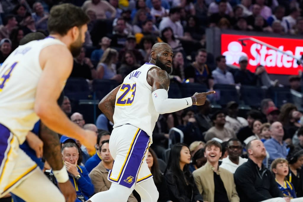 Los Angeles Lakers forward LeBron James (23) reacts after making a 3-point basket during the first half of an NBA basketball game against the Golden State Warriors, Saturday, Feb. 28, 2026, in San Francisco. (AP Photo/Godofredo A. Vásquez) AP