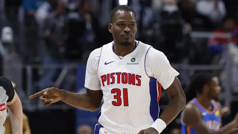 Detroit Pistons guard Javonte Green celebrates after a three-point basket