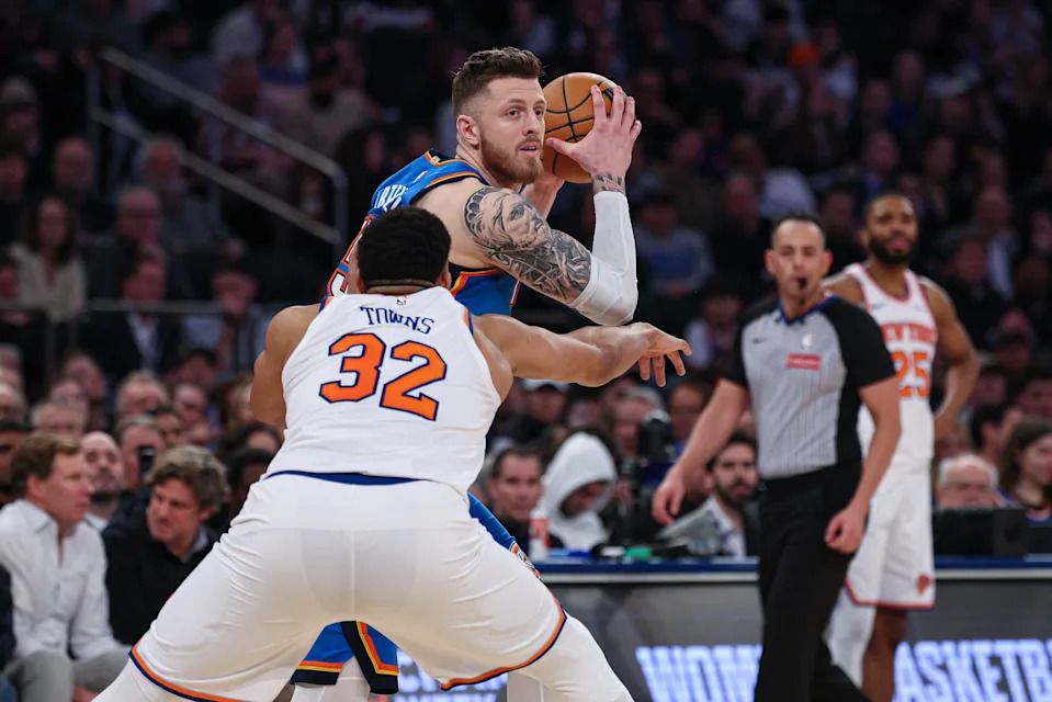 Mar 4, 2026; New York, New York, USA; Oklahoma City Thunder center Isaiah Hartenstein (55) is guarded by New York Knicks center Karl-Anthony Towns (32) during the first half at Madison Square Garden. Mandatory Credit: Vincent Carchietta-Imagn Images