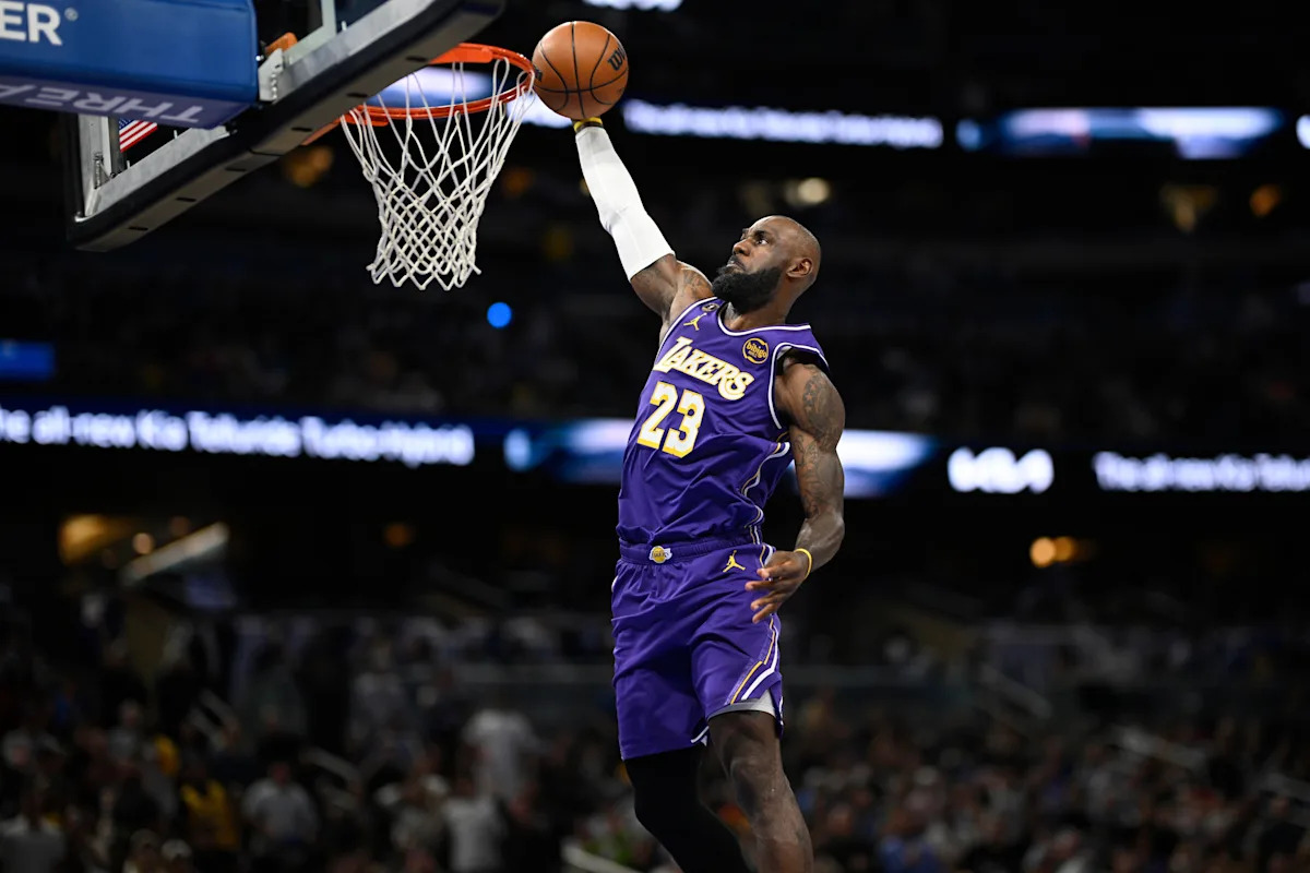 LeBron James breaks NBA mark for games played, Luke Kennard makes winning 3 in Lakers' win vs. Magic