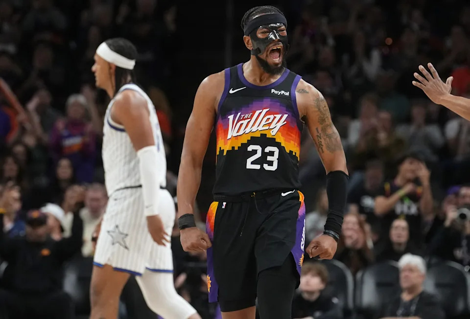 Phoenix Suns guard Jordan Goodwin (23) celebrates his 3-pointer against the Orlando Magic at Mortgage Matchup Center on Feb. 21, 2026, in Phoenix.