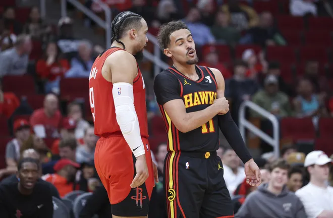 Dec 20, 2023; Houston, Texas, USA; Houston Rockets forward Dillon Brooks (9) and Atlanta Hawks guard Trae Young (11) exchange words during the third quarter at Toyota Center. Mandatory Credit: Troy Taormina-USA TODAY Sports