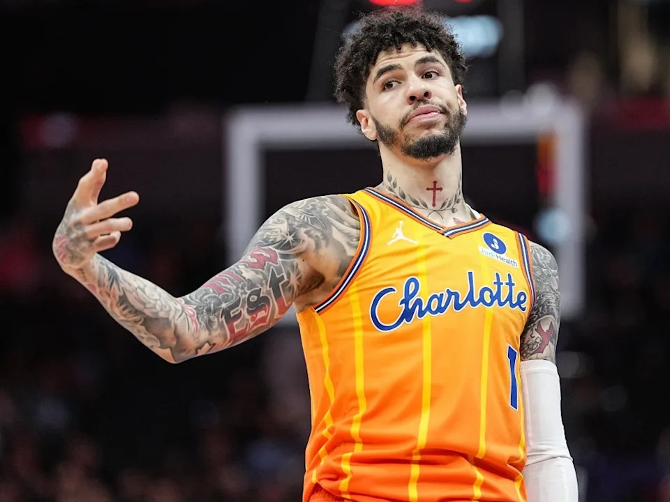  Charlotte Hornets guard LaMelo Ball gestures after making a three-point basket during a game against the Memphis Grizzlies.