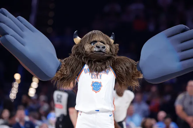 Oct 9, 2025; Oklahoma City, Oklahoma, USA; Oklahoma City Thunder mascot, Rumble the Bison, performs during a time out during the second half of a game between the Charlotte Hornets and the Oklahoma City Thunder at Paycom Center. Mandatory Credit: Alonzo Adams-Imagn Images