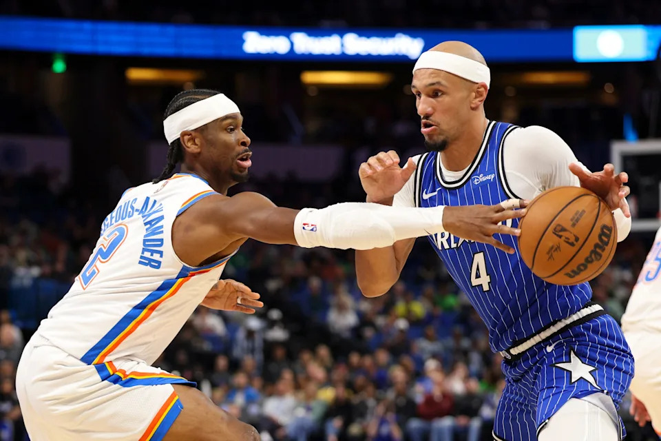 Mar 17, 2026; Orlando, Florida, USA; Oklahoma City Thunder guard Shai Gilgeous-Alexander (2) knocks the ball from Orlando Magic guard Jalen Suggs (4) in the first quarter at Kia Center. Mandatory Credit: Nathan Ray Seebeck-Imagn Images