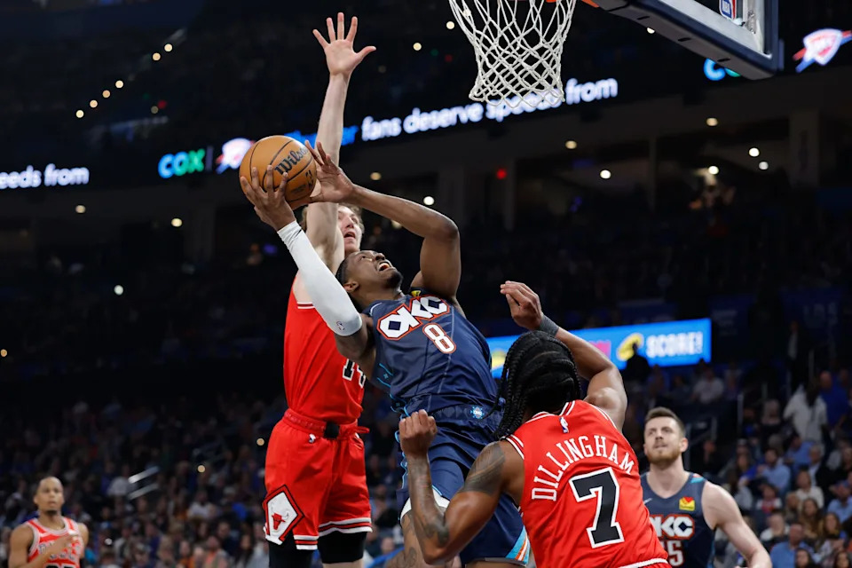 Mar 27, 2026; Oklahoma City, Oklahoma, USA; Oklahoma City Thunder guard Jalen Williams (8) goes up for a basket between Chicago Bulls forward Matas Buzelis (14) and guard Rob Dillingham (7) during the first quarter at Paycom Center. Mandatory Credit: Alonzo Adams-Imagn Images