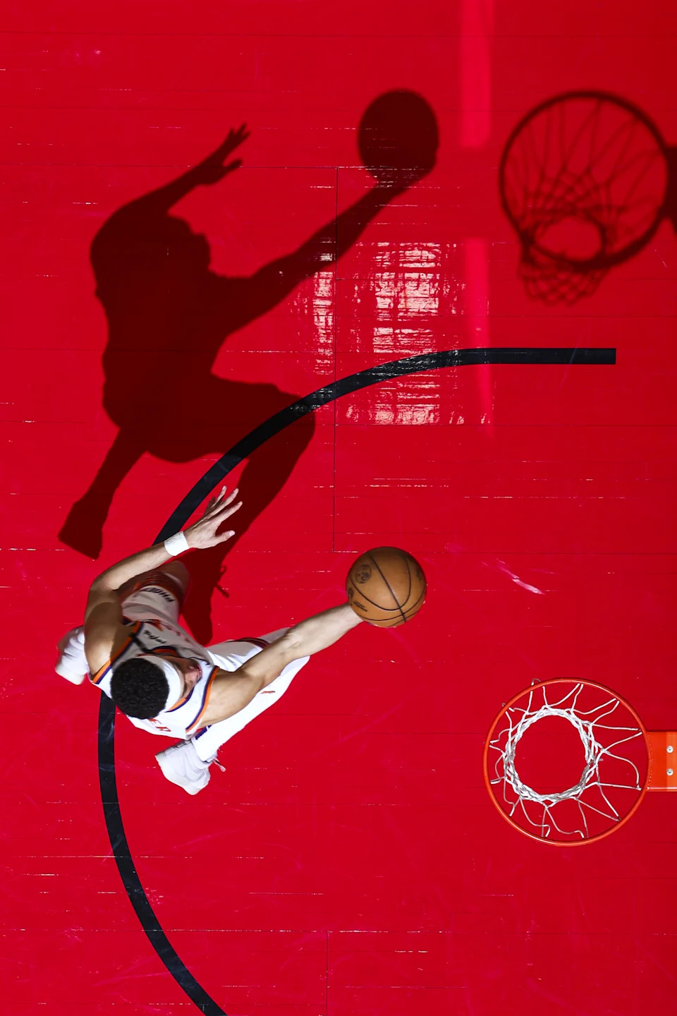TORONTO, CANADA - FEBRUARY 23: Devin Booker #1 of the Phoenix Suns drives to the basket during the game against the Toronto Raptors on February 23, 2025 at the Scotiabank Arena in Toronto, Ontario, Canada. NOTE TO USER: User expressly acknowledges and agrees that, by downloading and or using this Photograph, user is consenting to the terms and conditions of the Getty Images License Agreement. Mandatory Copyright Notice: Copyright 2025 NBAE (Photo by Vaughn Ridley/NBAE via Getty Images) | NBAE via Getty Images