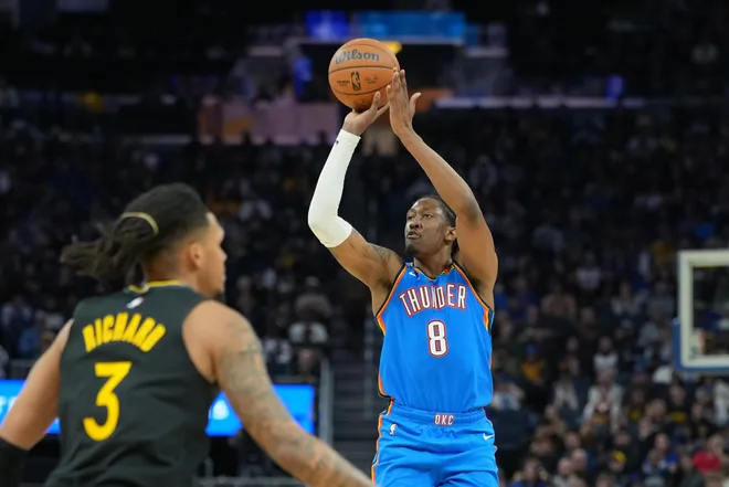 Jan 2, 2026; San Francisco, California, USA; Oklahoma City Thunder guard Jalen Williams (8) shoots against Golden State Warriors guard Will Richard (3) during the third quarter at Chase Center. Mandatory Credit: Darren Yamashita-Imagn Images